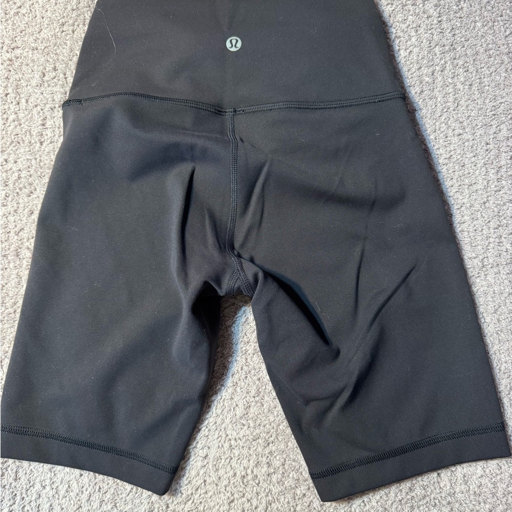 Black Lululemon Bike Shorts with Wide Waistband and Stretchy Fit - Picture 2 of 2